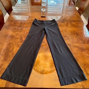 Nike DRI-FIT flared yoga pants, black, size XS